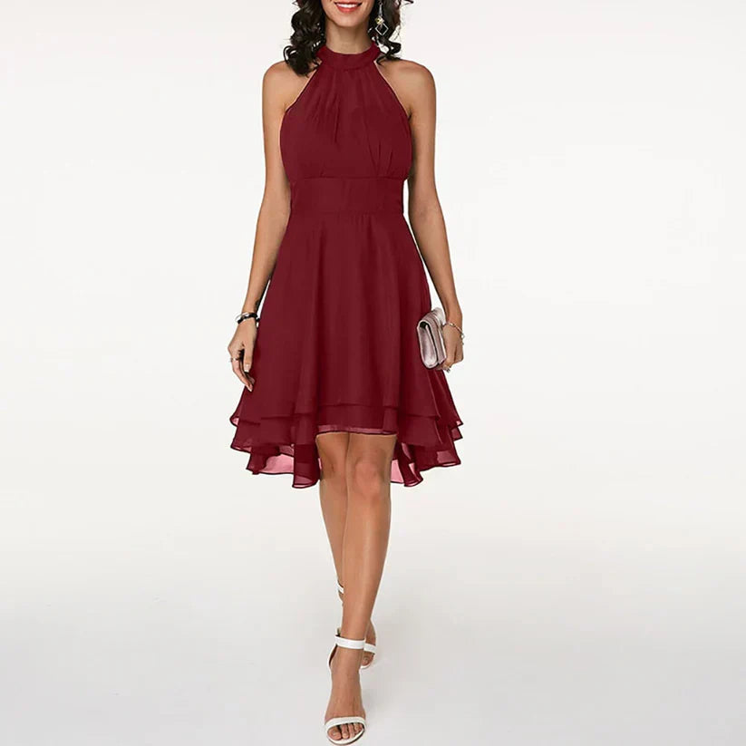 Minikleid Damen mit Neckholder-Ausschnitt und Chiffon-Stufenrock in High-Low-Schnitt – Blanchette